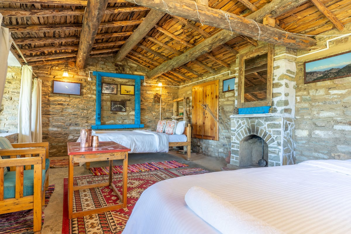 Bedroom 1 with 2 Queen beds and fireplace